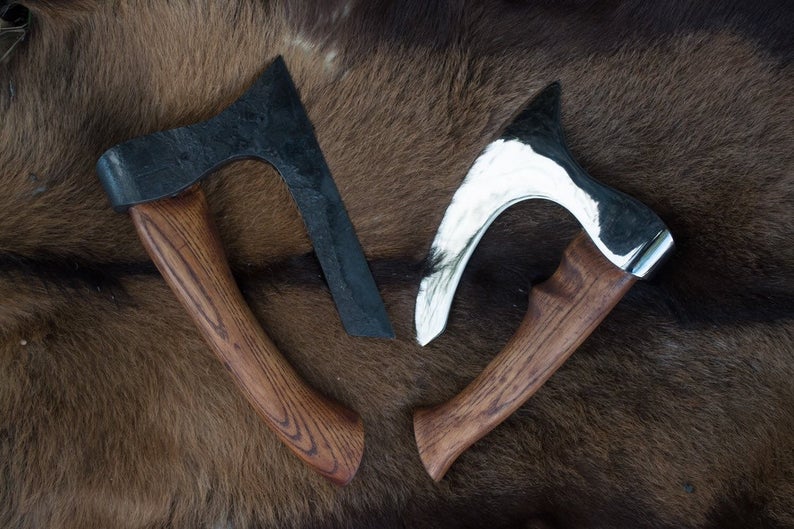 Forged fist axe with a case